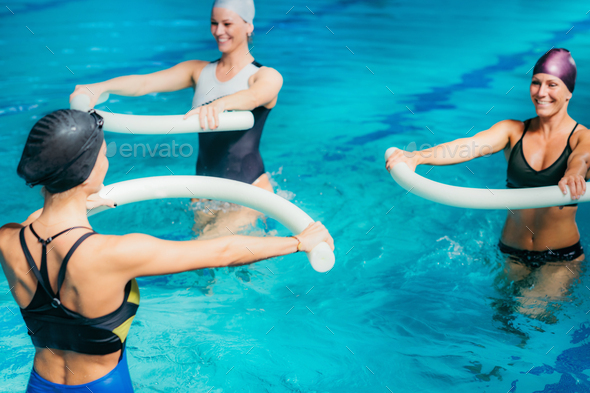 Aqua Aerobic Training with Water Fitness Equipment.